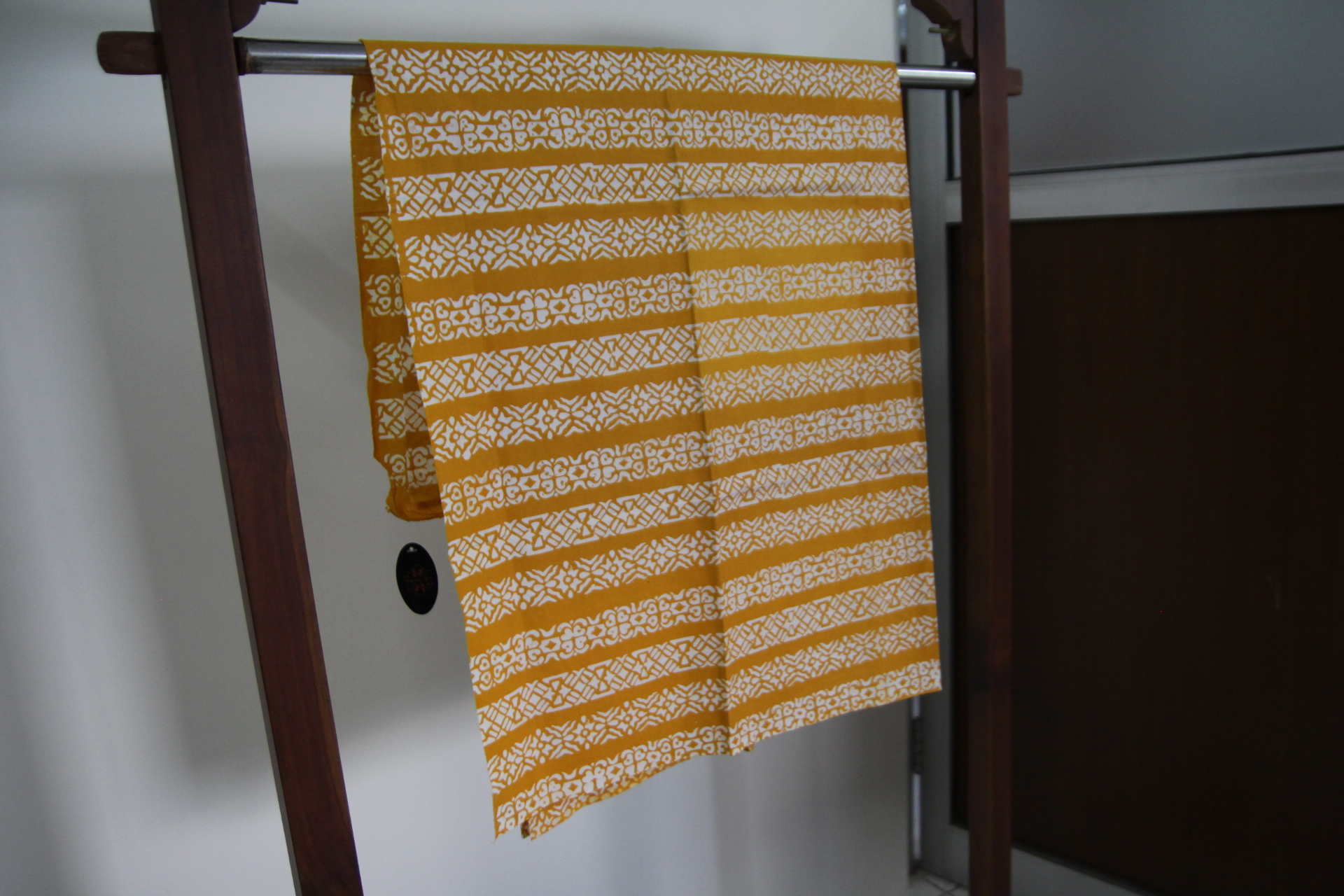 Kain cap  kunyit corak